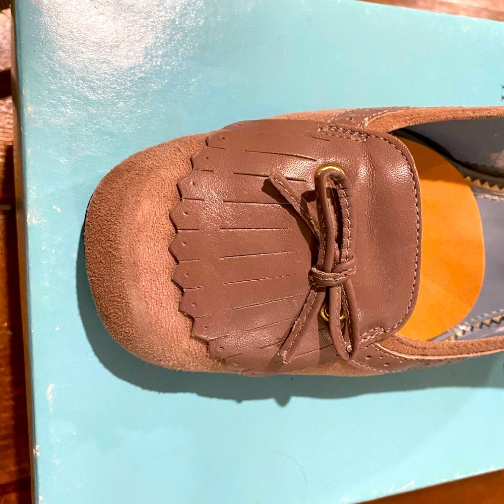 Audrey Brooke tassel loafer-style suede heels.